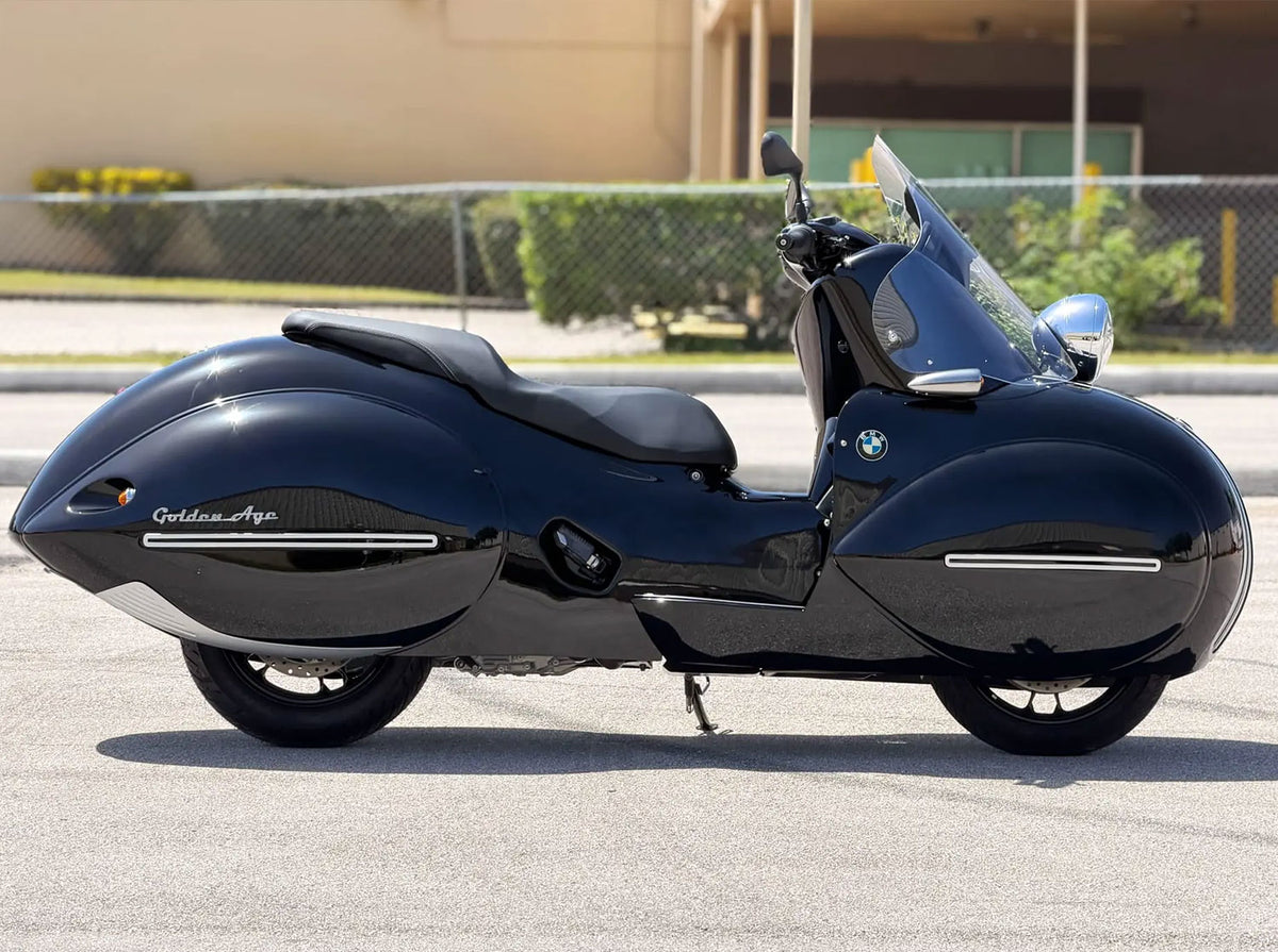 Golden Age scooter sketch: enclosed streamlined bodywork over both wheels