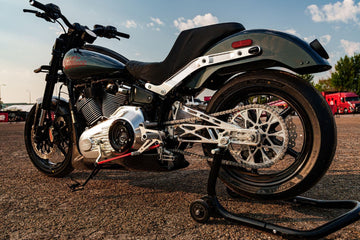 2025 Harley-Davidson Low Rider S custom, rear three-quarter view with chain drive and billet swingarm