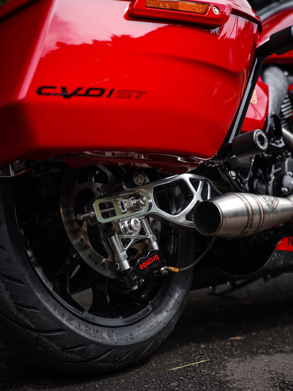 Raceworks billet swingarm on a red Harley-Davidson CVO ST